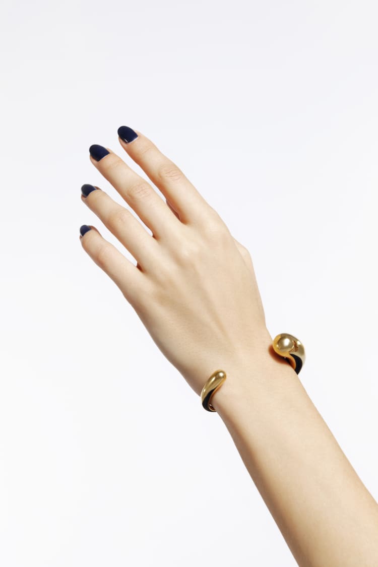 Bracciale rigido torque in oro
