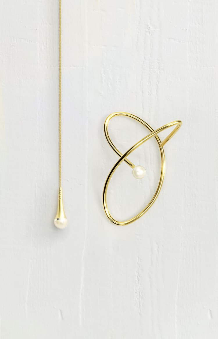 Ear cuff en or avec perle et chaîne