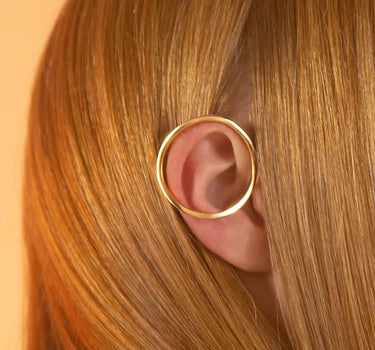 Circular ear-cuff in gold