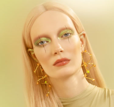 Orecchini pendenti bold in oro con cristalli di opale e topazio