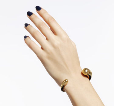 Bracciale rigido torque in oro