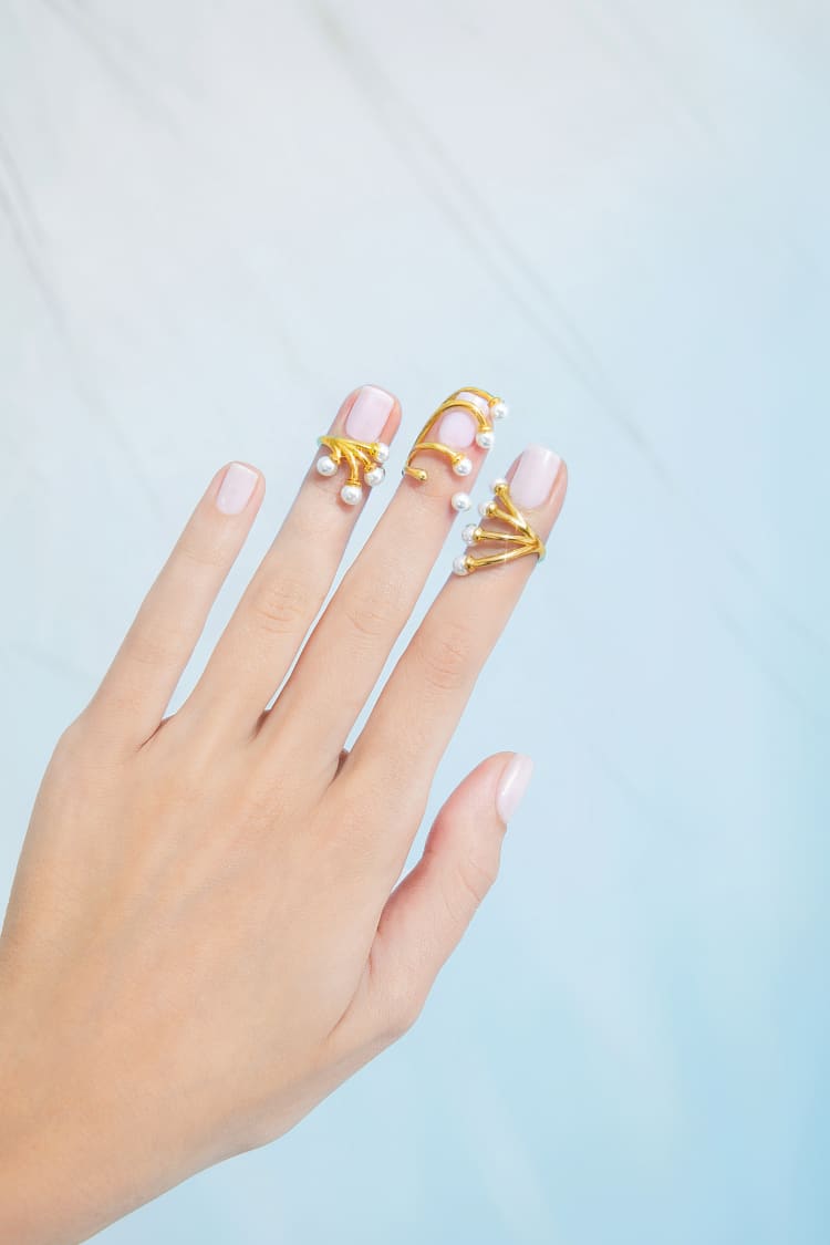 Set di anelli per unghie con mini perle