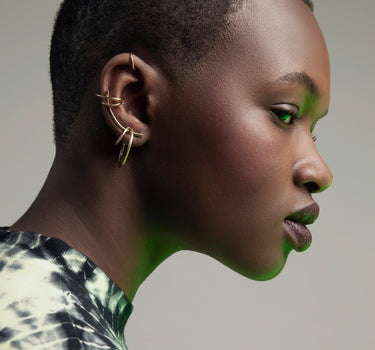 Set aus goldenen Ear Cuffs