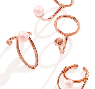 Set of rose gold nail rings with pearls